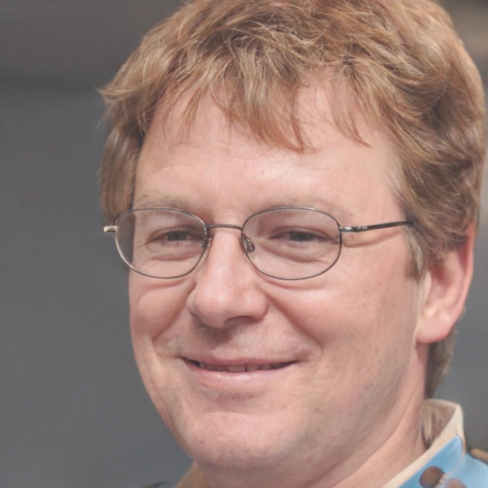 Professional headshot of male financial analyst instructor